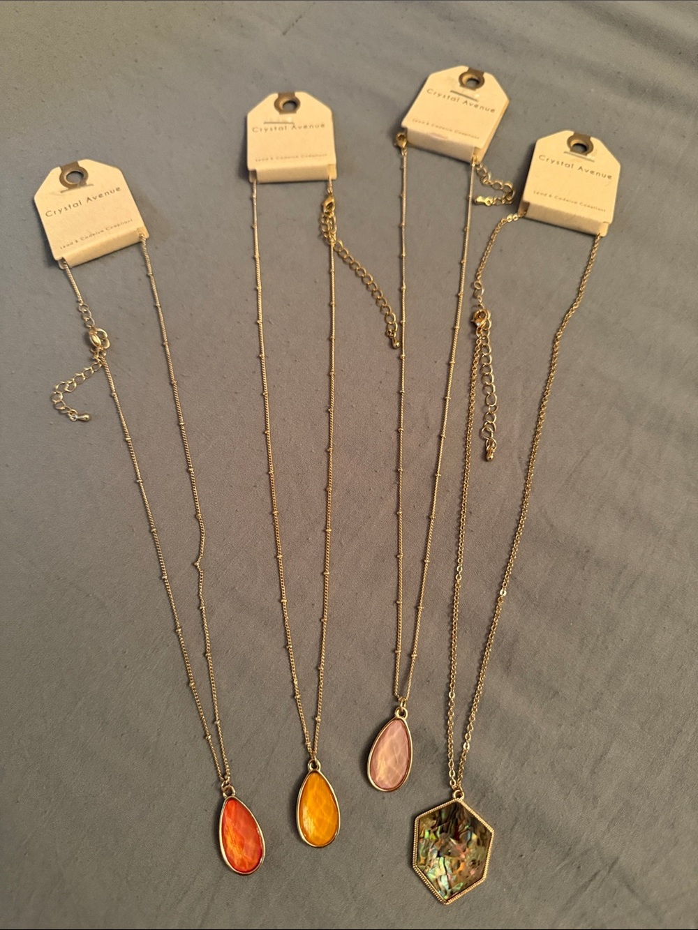 Bundle of 4 Gold Necklaces with pendant never worn